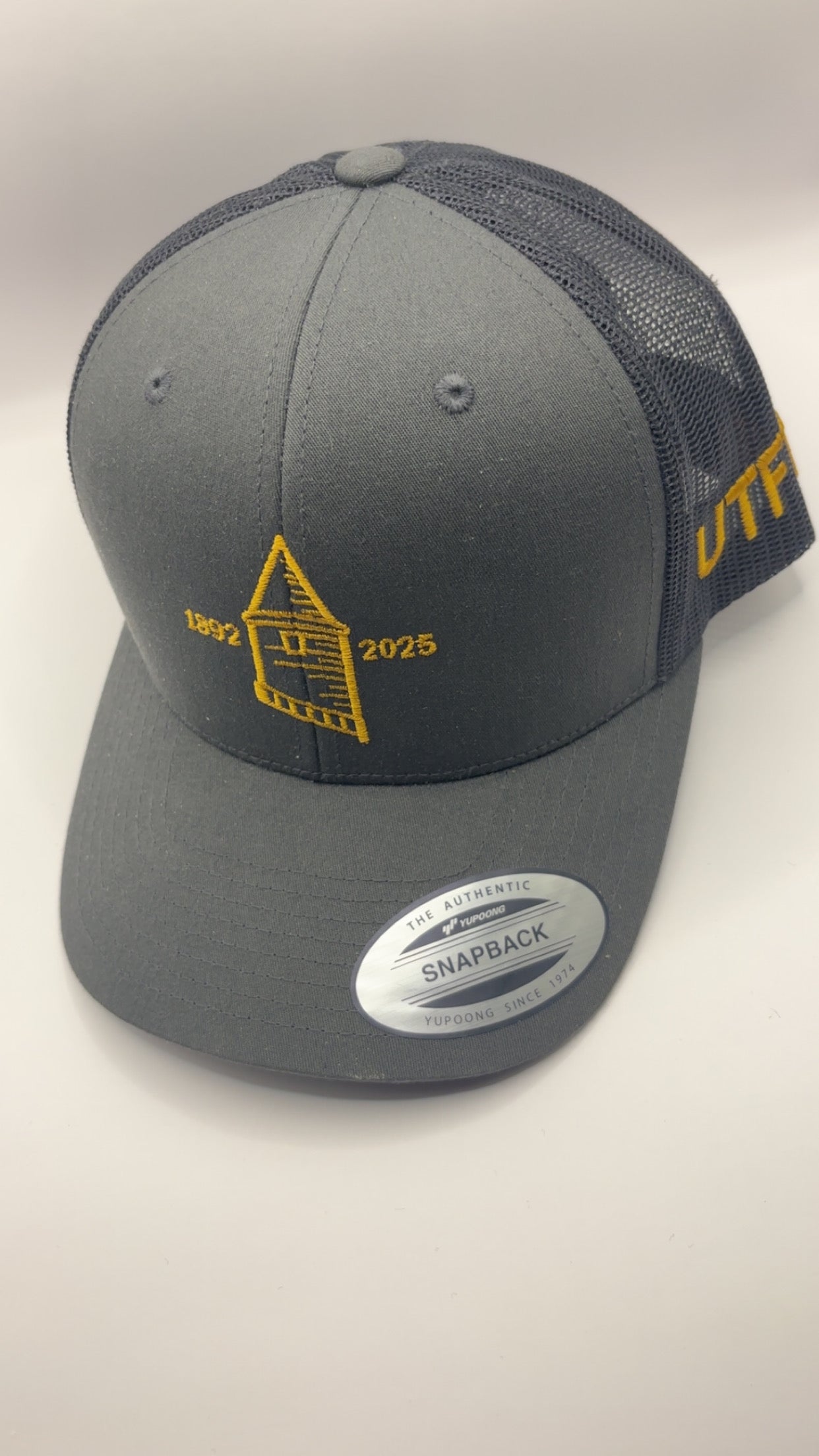 Grey and gold commemorative goodison park caps